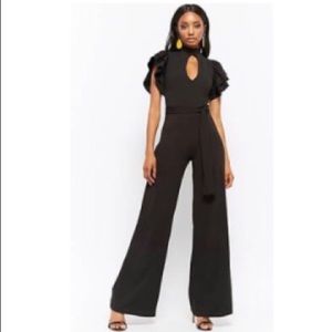 Black ruffled jumpsuite new never worn